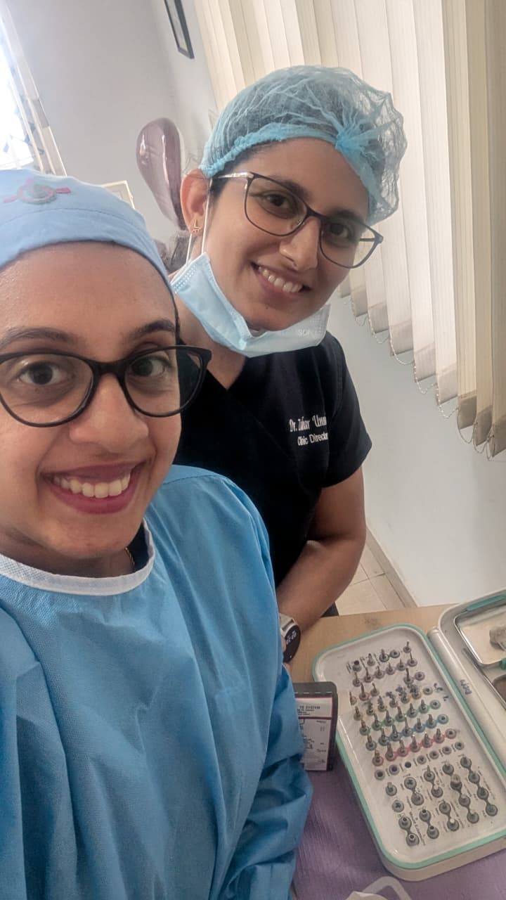 Happy patient with Dr. Zahar Unnissa at MIZ Dental Clinic